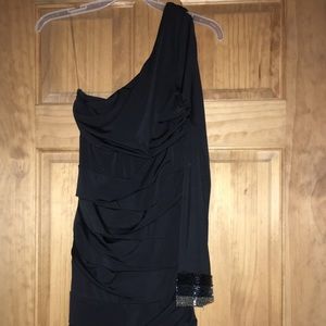 NWOT flirty and sexy little black dress